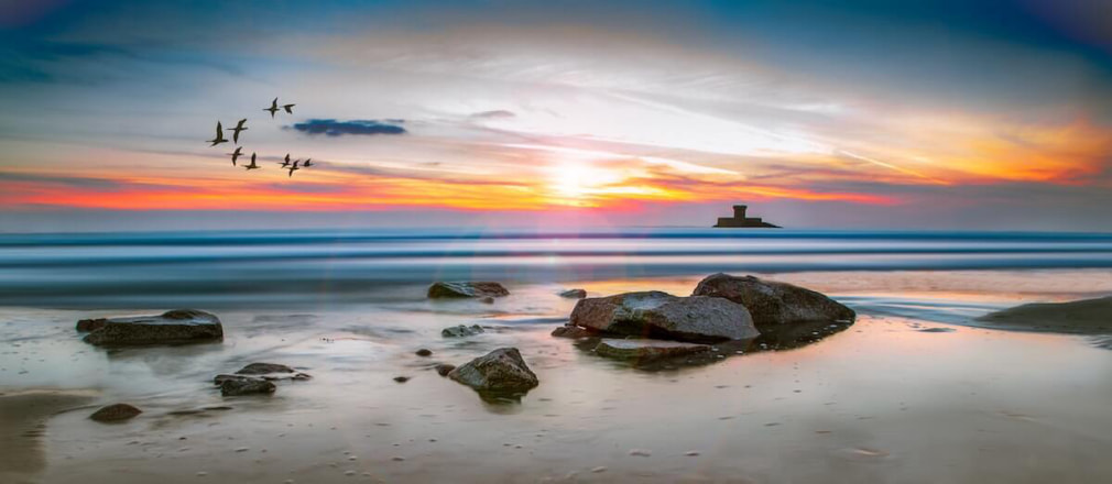 Sunset on a rocky beach